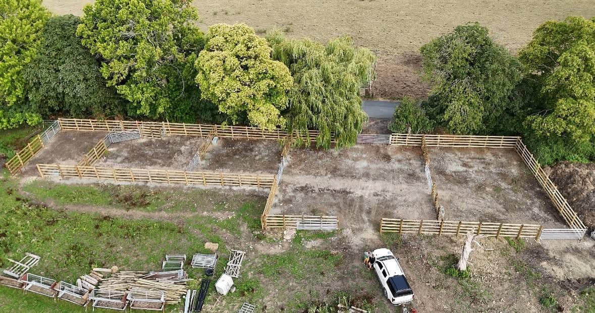 Aerial view of a timber cattle handling yard part-way through construction
